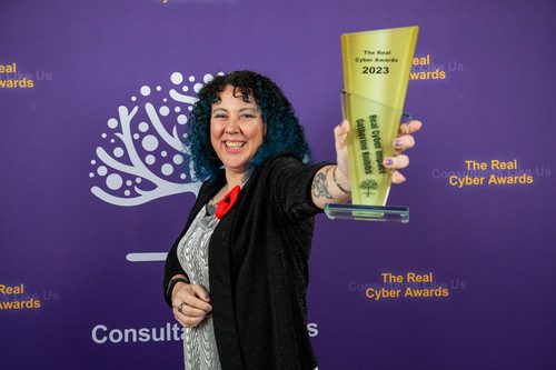 Catherine Knibbs with the Real Cyber Awards trophy