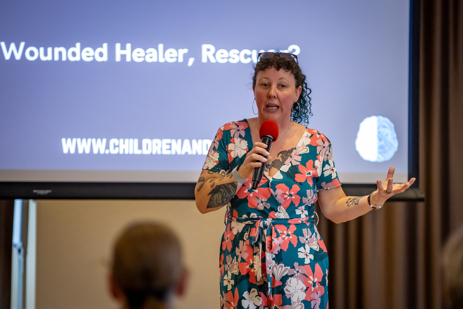 Dr Catherine Knibbs speaking on stage